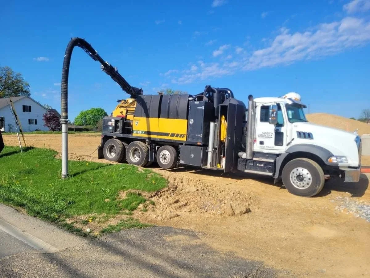 Hydro excavation truck on a site work job beside a road